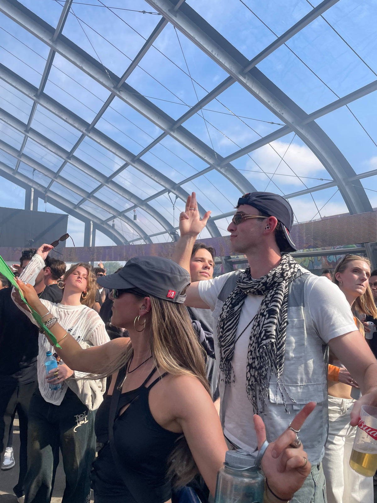 Archive Army Cap in grey, worn at an open-air rave under a glass dome